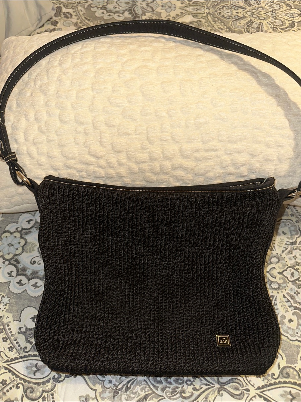 The Sak Black Exterior with Teal and Lime Checkerboard Lining Shoulder Bag